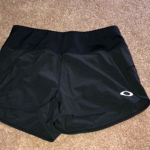 Brand new! Black Oakley running shorts.